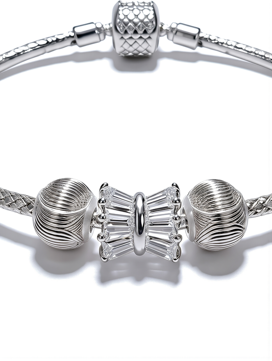 Élodie Bow Bracelet featuring intricate textured detailing and a crystal centerpiece for timeless elegance.