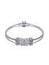 Élodie Bow Bracelet featuring a textured silver band and sparkling centerpiece, perfect for elegant everyday wear.